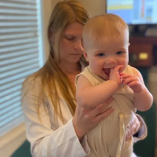 Chiropractor-San-Antonio-TX-McKenzie-Slattery-Checking-Patient-Back