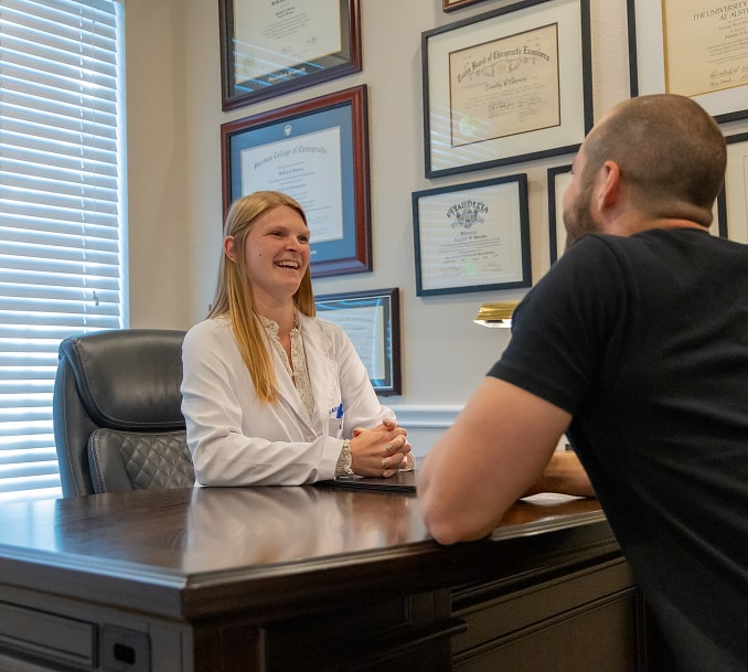 Doctor meeting with a patient in an office
